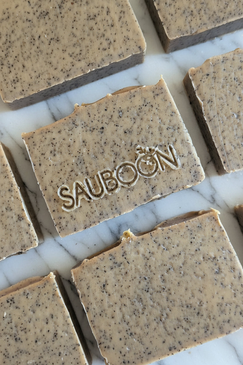 Sauboon Handcrafted Soaps: Luxurious, small-batch soaps enriched with natural clays for pure, radiant, and refined skin.

Experience natural luxury with Sauboon’s clay-infused, handcrafted soaps — made in small batches for elegant, honest skincare.

Sauboon creates luxurious, clay-based soaps crafted in small batches — pure, natural skincare with a touch of artistry.