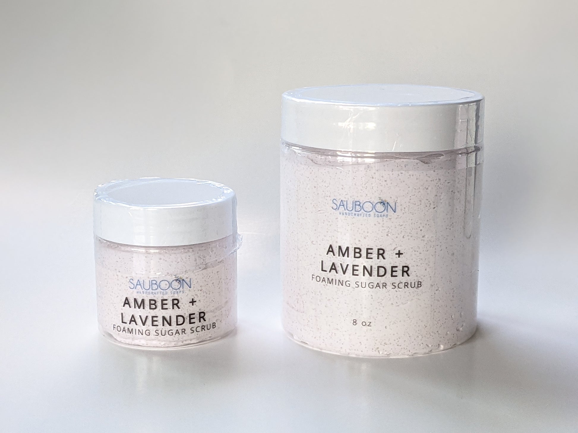 Amber + Lavender Foaming Sugar Scrubs, made in San Diego in small batches.  Highest quality ingredients used to give the best lather, nourishment, exfoliation and cleansing experience.  Made with organic cane sugar, jojoba oil and sweet almond oil. Great for gifting for birthdays, celebrations, bridal showers or a spa self care gift to yourself! 