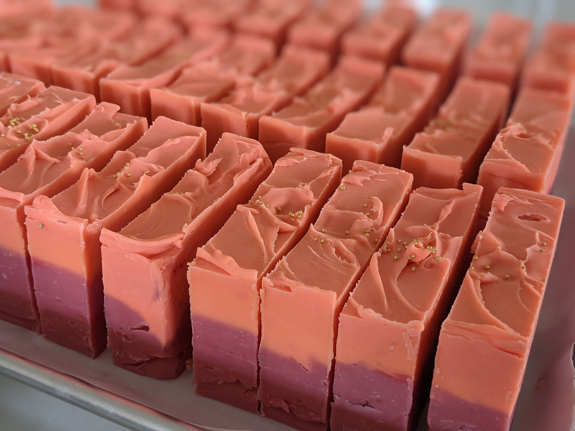 Mango Papaya vegan handcrafted soaps. Our handcrafted vegan luxurious soaps are made locally here in San Diego in small batches.  Highest quality ingredients used to give the best lather, nourishment, and cleansing experience.  We use different type of clays in each soap including rhasoul clay, kaolin clay, rose clay, red Moroccan clay, French green clay which add to the beautiful washing experience using our soaps. Great for gifting for birthdays, celebrations, bridal showers or self care gift to yourself!